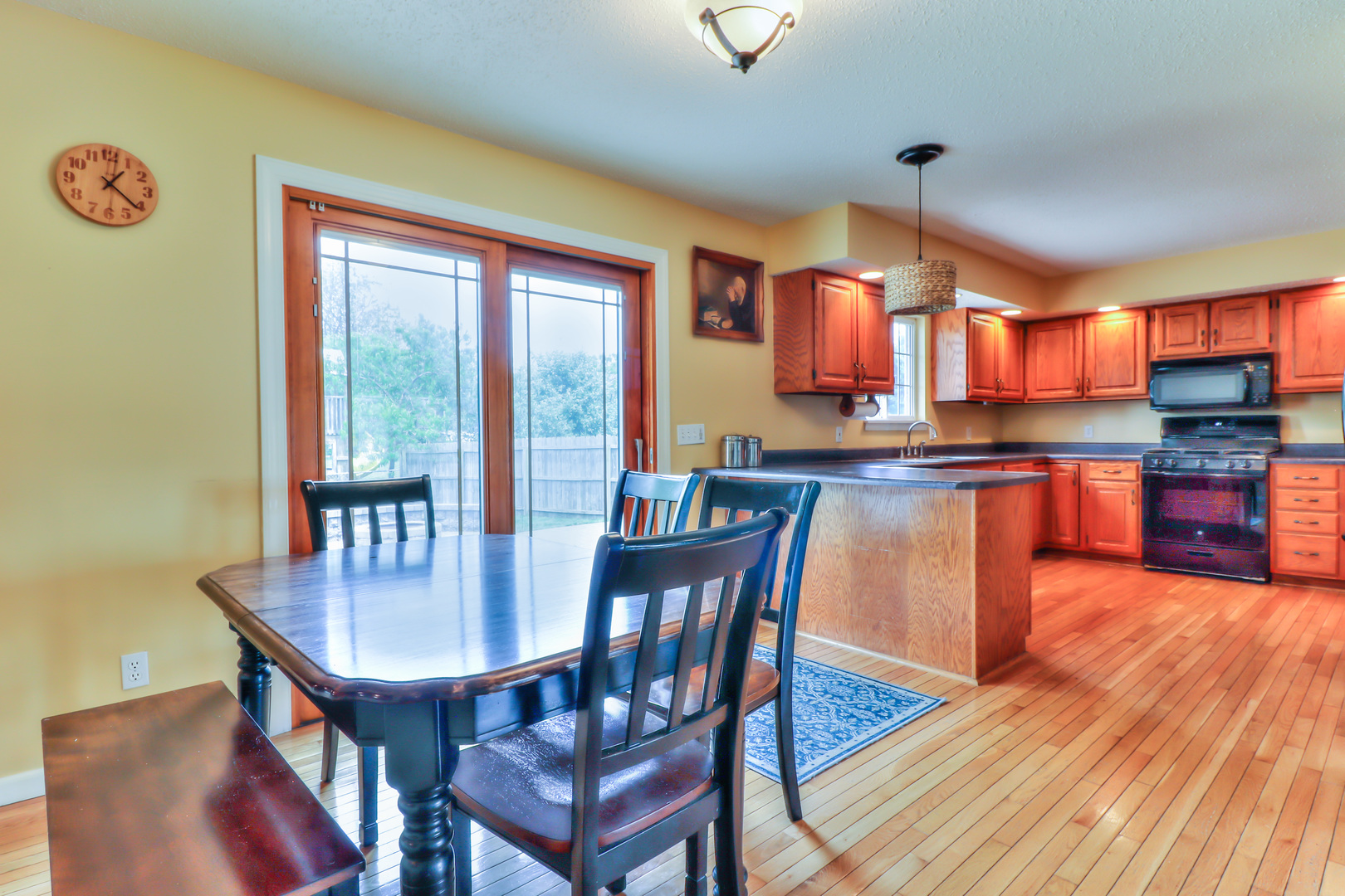 3202 Sharon Drive Champaign, IL 61822 - Photo 19 of 37 a dining room with furniture and wooden floor