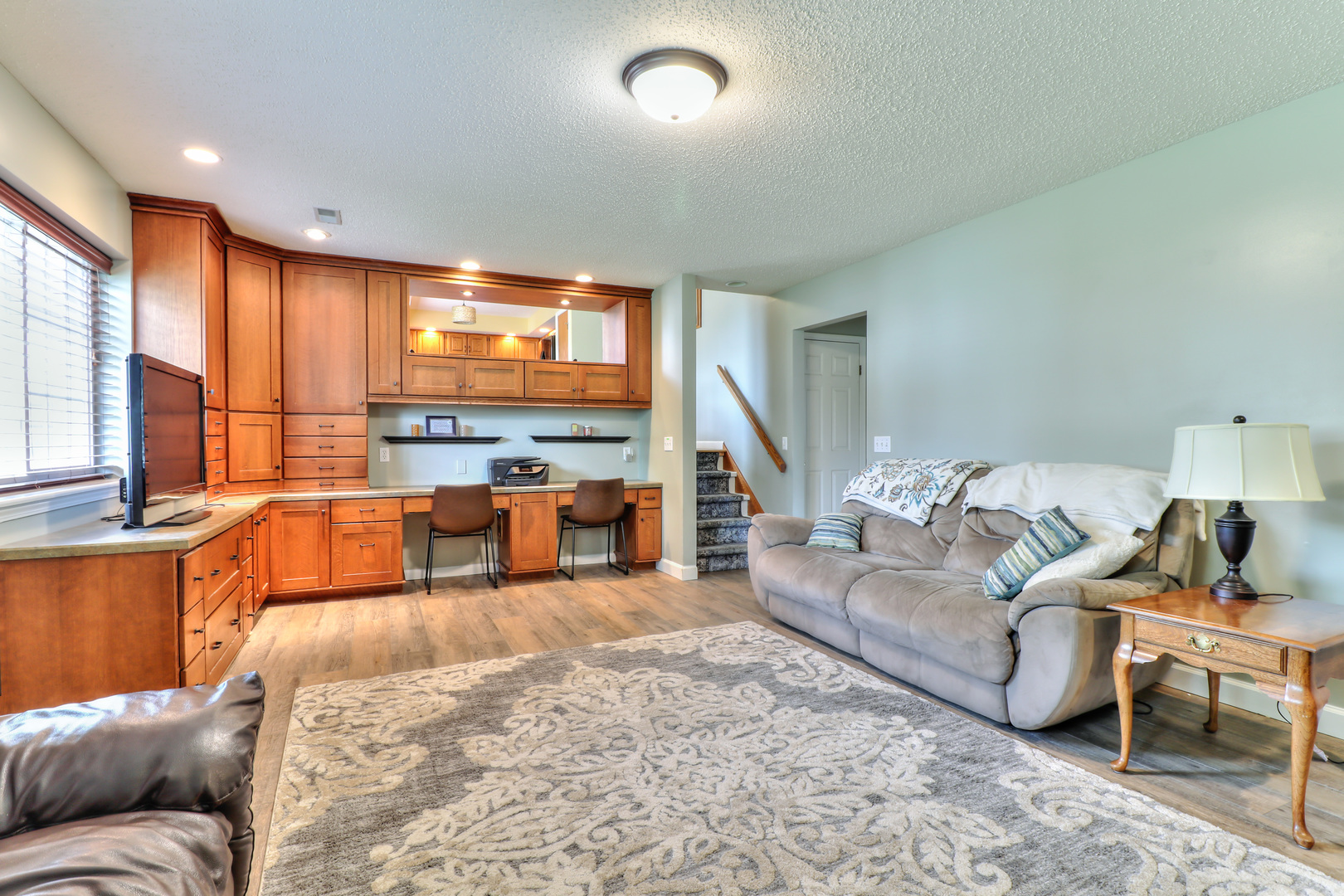 3202 Sharon Drive Champaign, IL 61822 - Photo 24 of 37 a living room with furniture and a flat screen tv