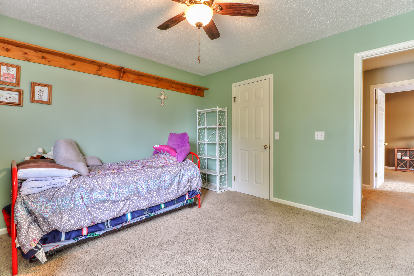 3202 Sharon Drive Champaign, IL 61822 - Photo 36 of 37 a bedroom with a bed and a chandelier