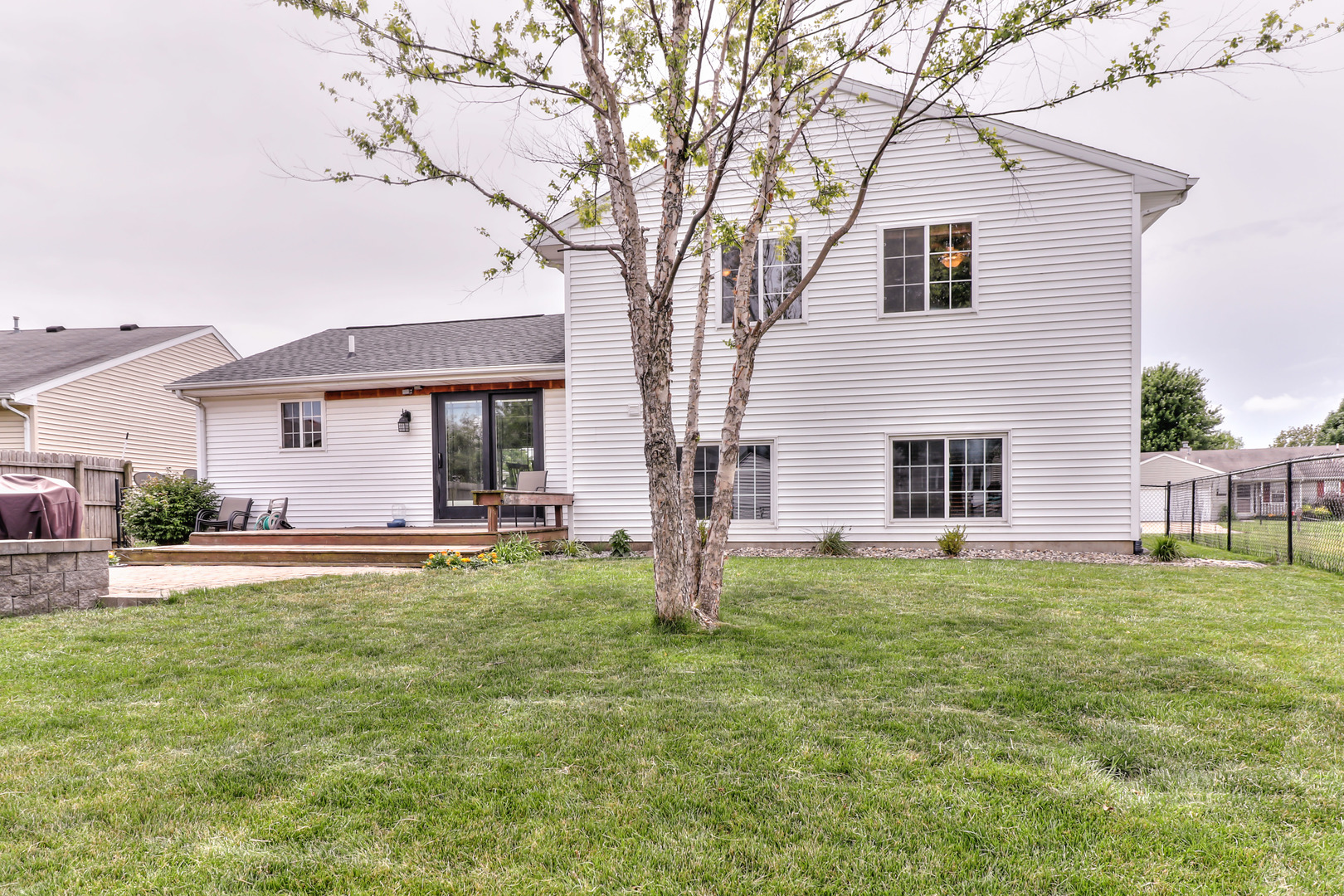 3202 Sharon Drive Champaign, IL 61822 - Photo 5 of 37 a view of a house with a yard and sitting area