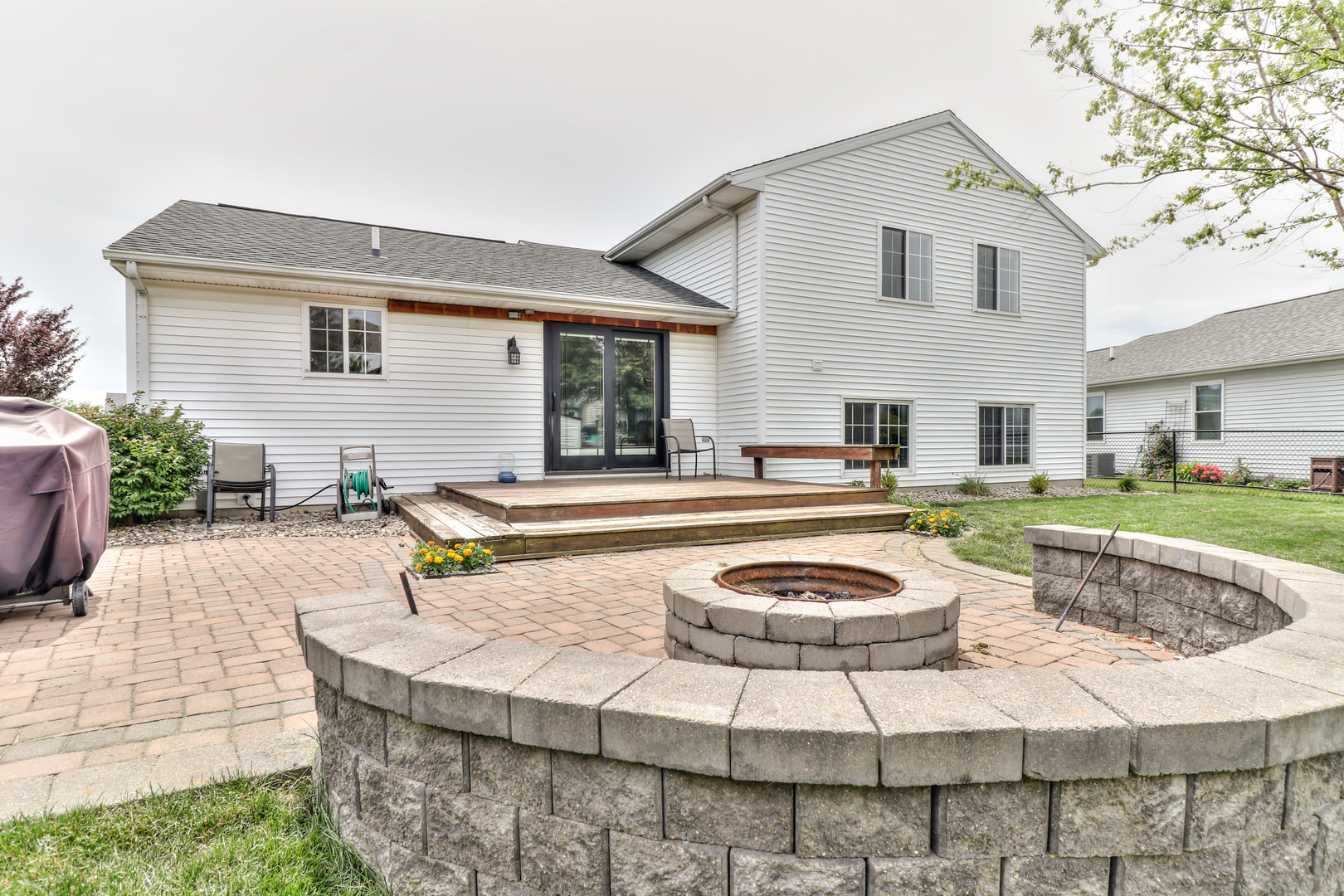 3202 Sharon Drive Champaign, IL 61822 - Photo 7 of 37 a swimming pool with outdoor seating and yard