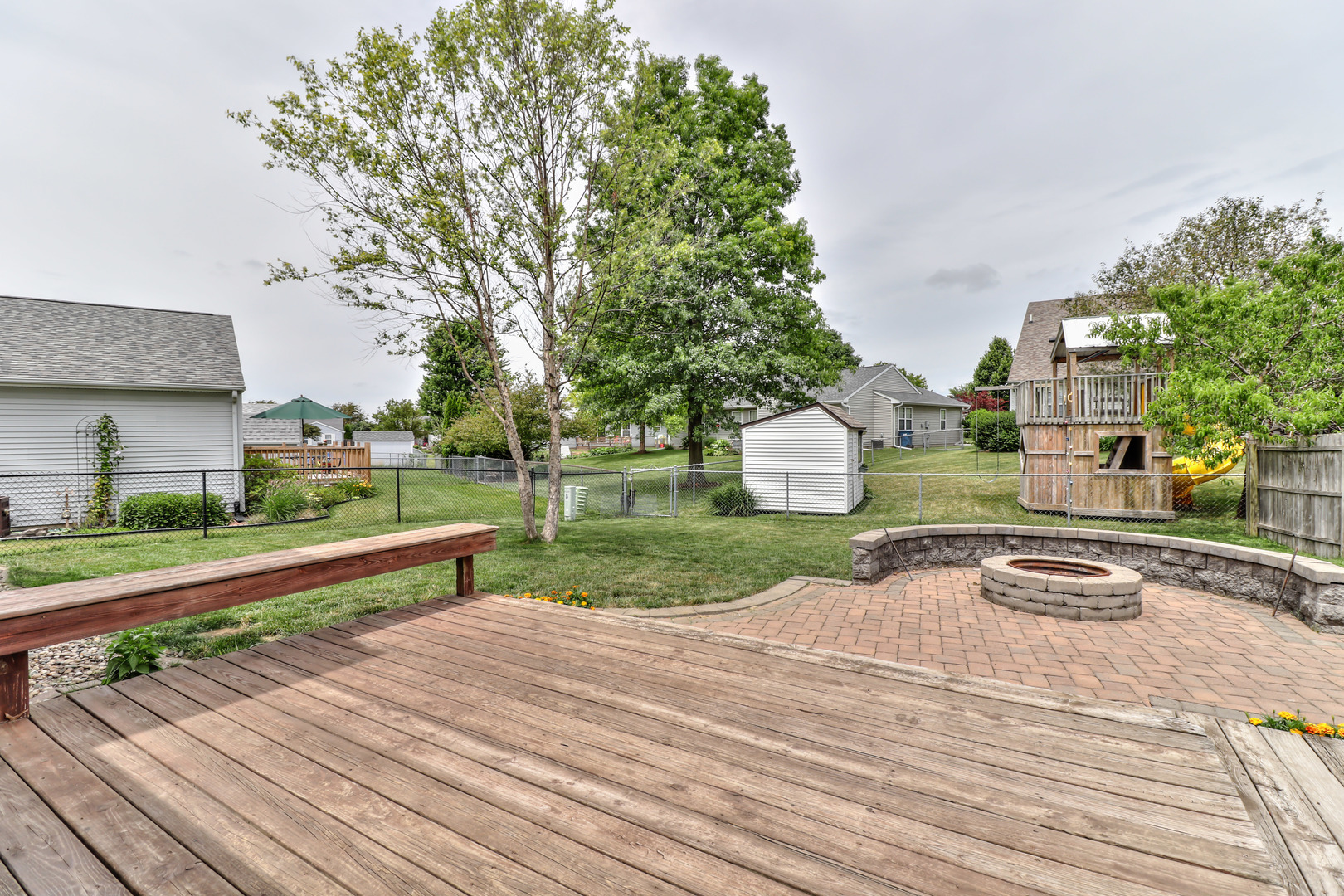 3202 Sharon Drive Champaign, IL 61822 - Photo 9 of 37 a park view with a bench and trees
