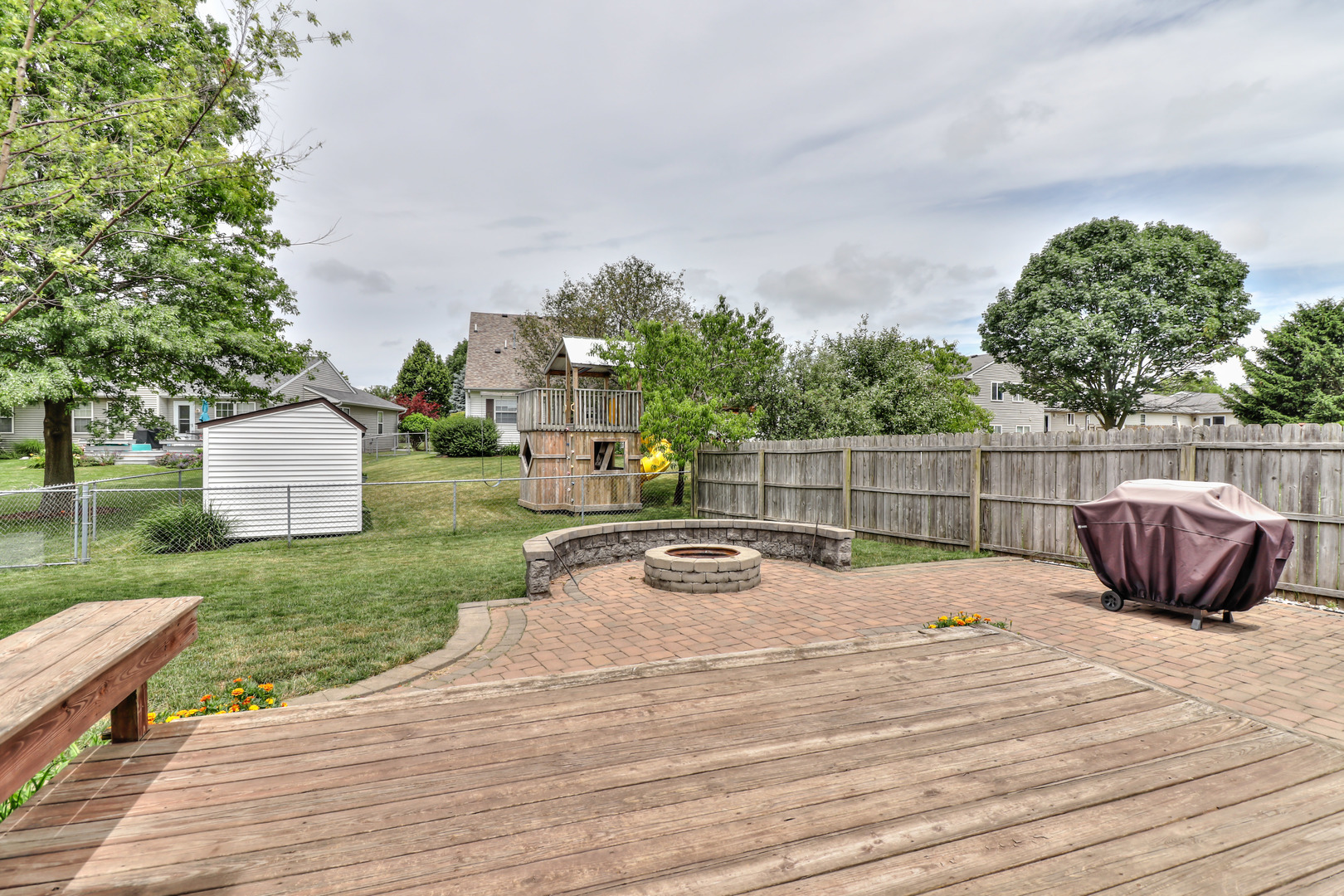 3202 Sharon Drive Champaign, IL 61822 - Photo 10 of 37 a backyard of a house with table and chairs