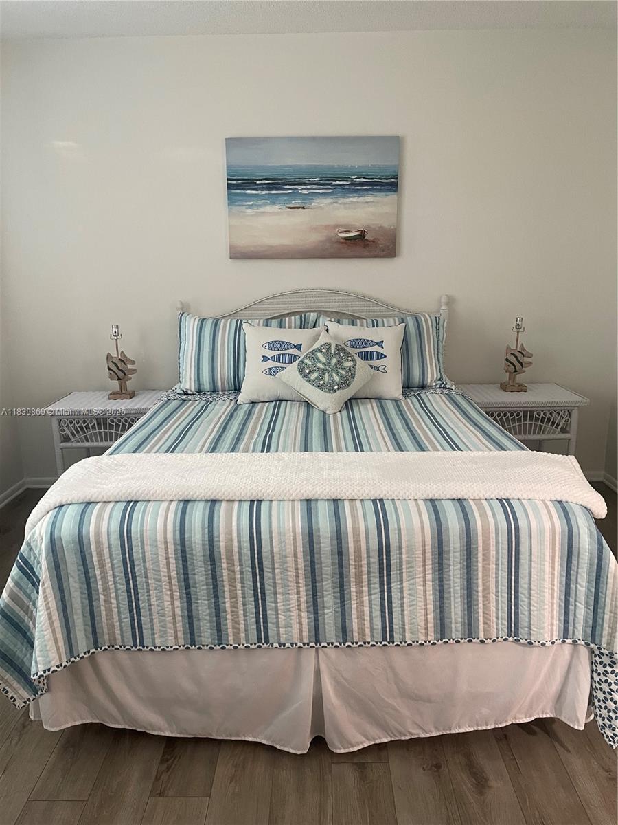 1115 Hernando Street, Unit A Fort Pierce, FL 34949 - Photo 16 of 18 a bedroom with a bed and window