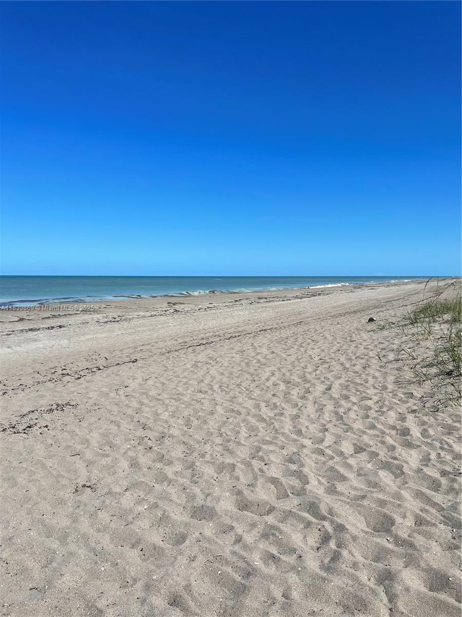 1115 Hernando Street, Unit A Fort Pierce, FL 34949 - Photo 7 of 18 a view of beach and ocean