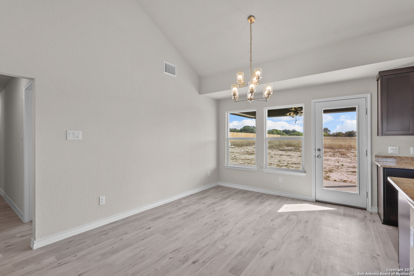 30 Log Cabin Way Poteet, TX 78065 - Photo 17 of 47 an empty room with windows and entrance
