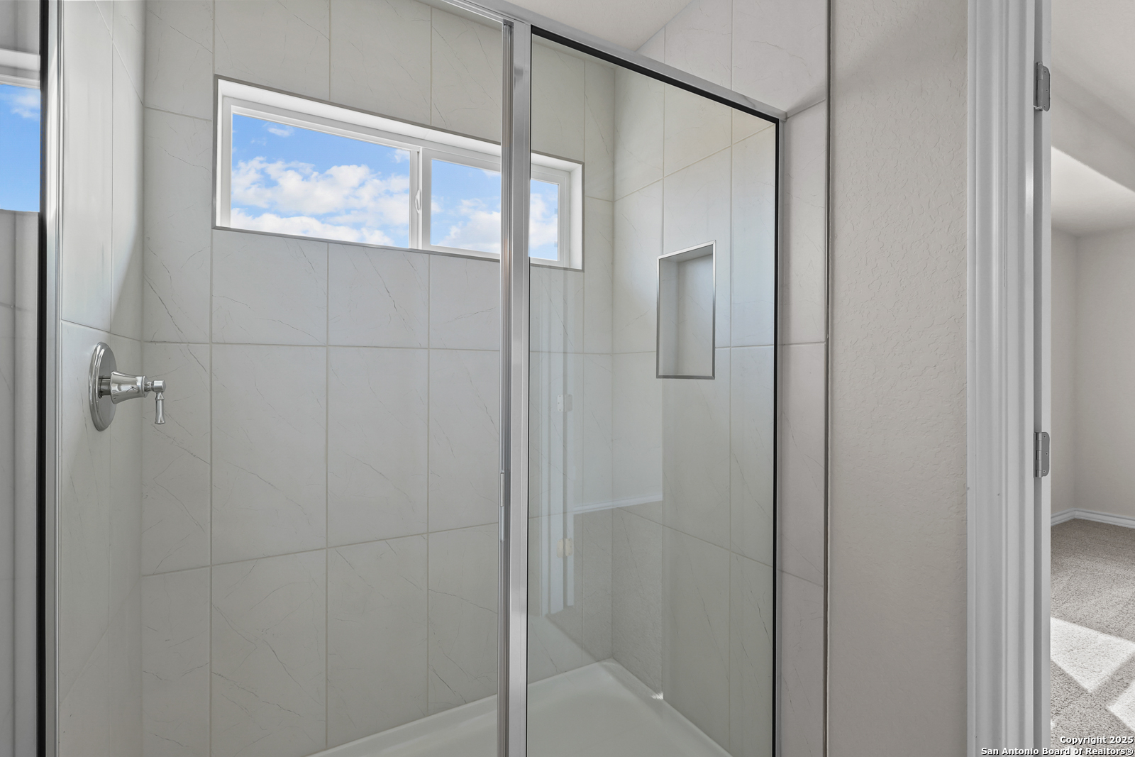 30 Log Cabin Way Poteet, TX 78065 - Photo 24 of 47 a bathroom with a shower and a glass door