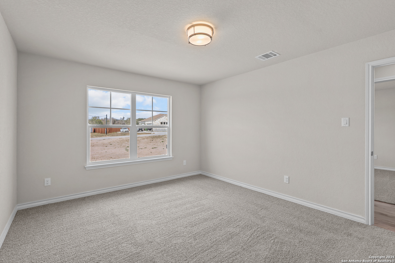 30 Log Cabin Way Poteet, TX 78065 - Photo 28 of 47 an empty room with a window