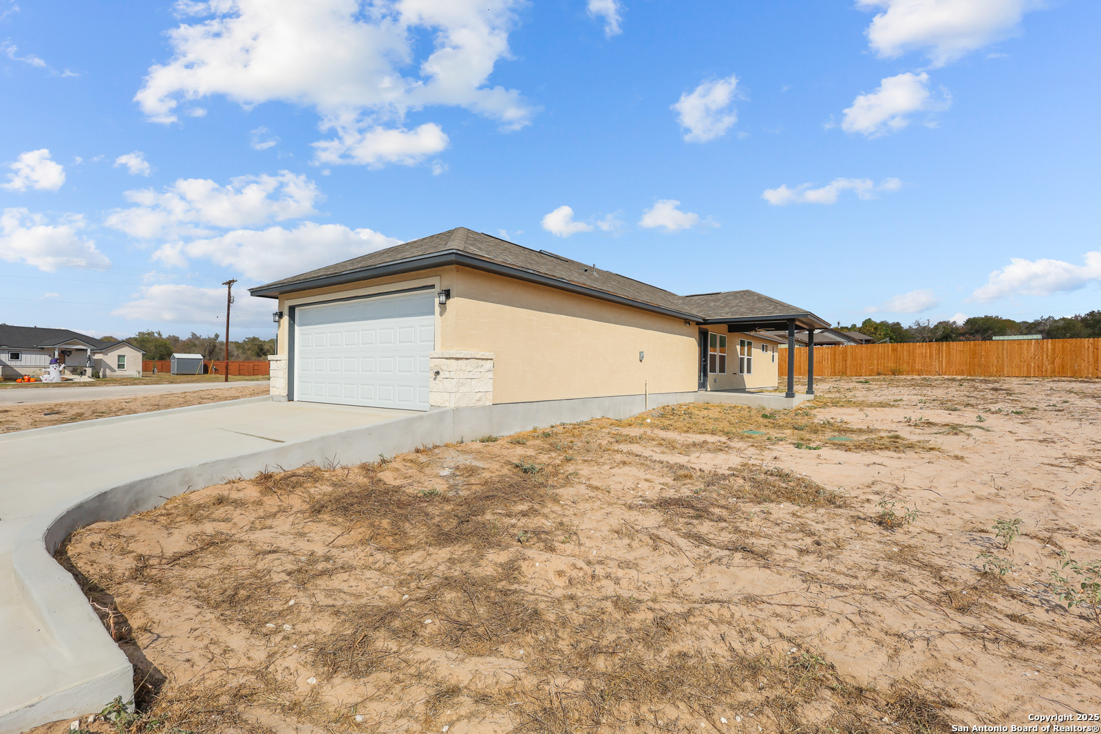 30 Log Cabin Way Poteet, TX 78065 - Photo 33 of 47 a view of a house with a yard