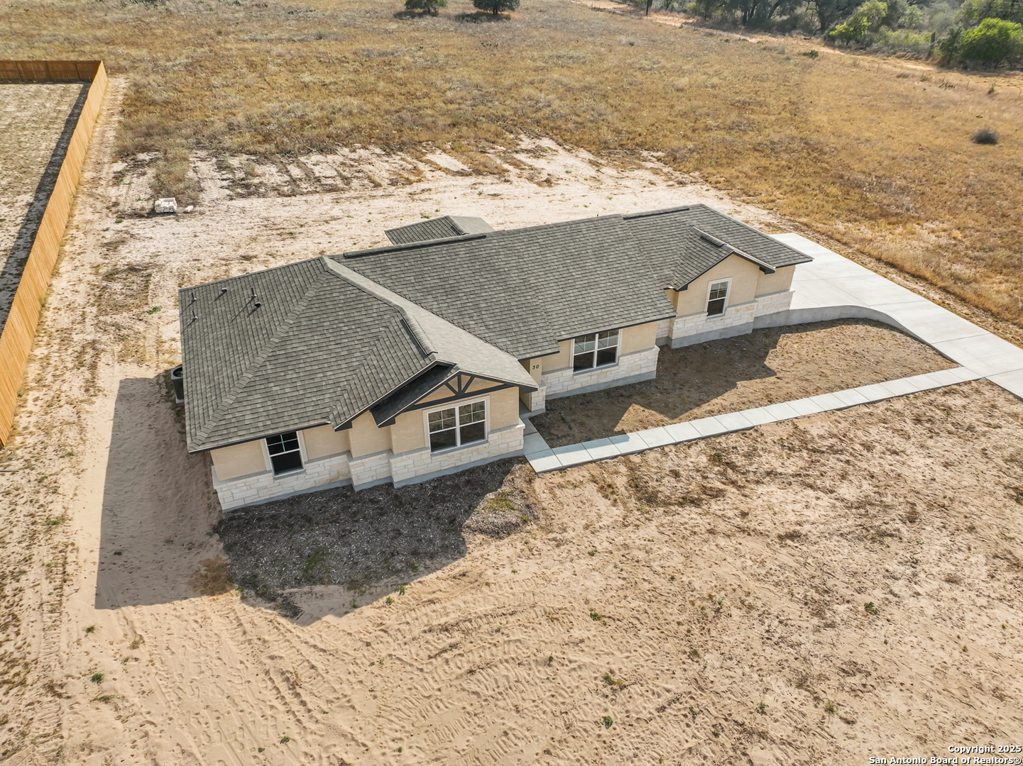 30 Log Cabin Way Poteet, TX 78065 - Photo 39 of 47 an aerial view of a house