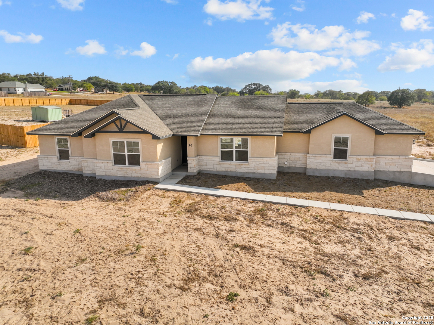 30 Log Cabin Way Poteet, TX 78065 - Photo 46 of 47 a view of a house with a ocean view