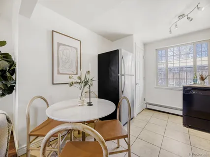 a workspace with furniture and window