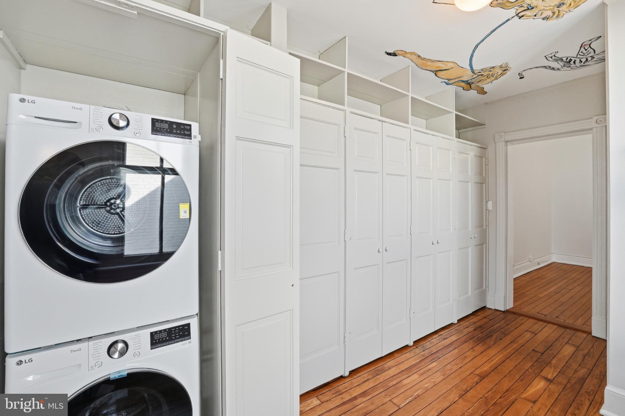 1635 35th Street Northwest Washington, DC 20007 - Photo 17 of 27 a view of a bedroom with washer and dryer