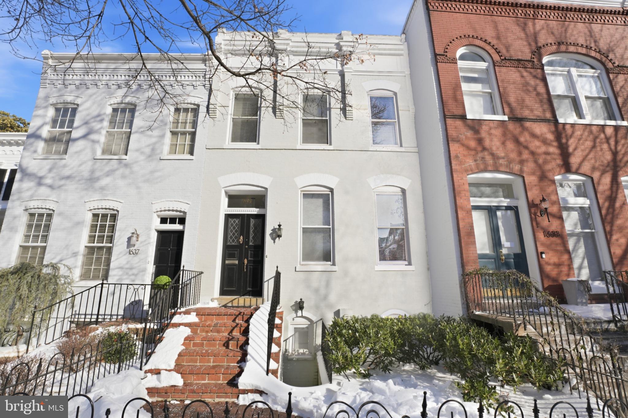 1635 35th Street Northwest Washington, DC 20007 - Photo 2 of 27 a front view of a building with many windows