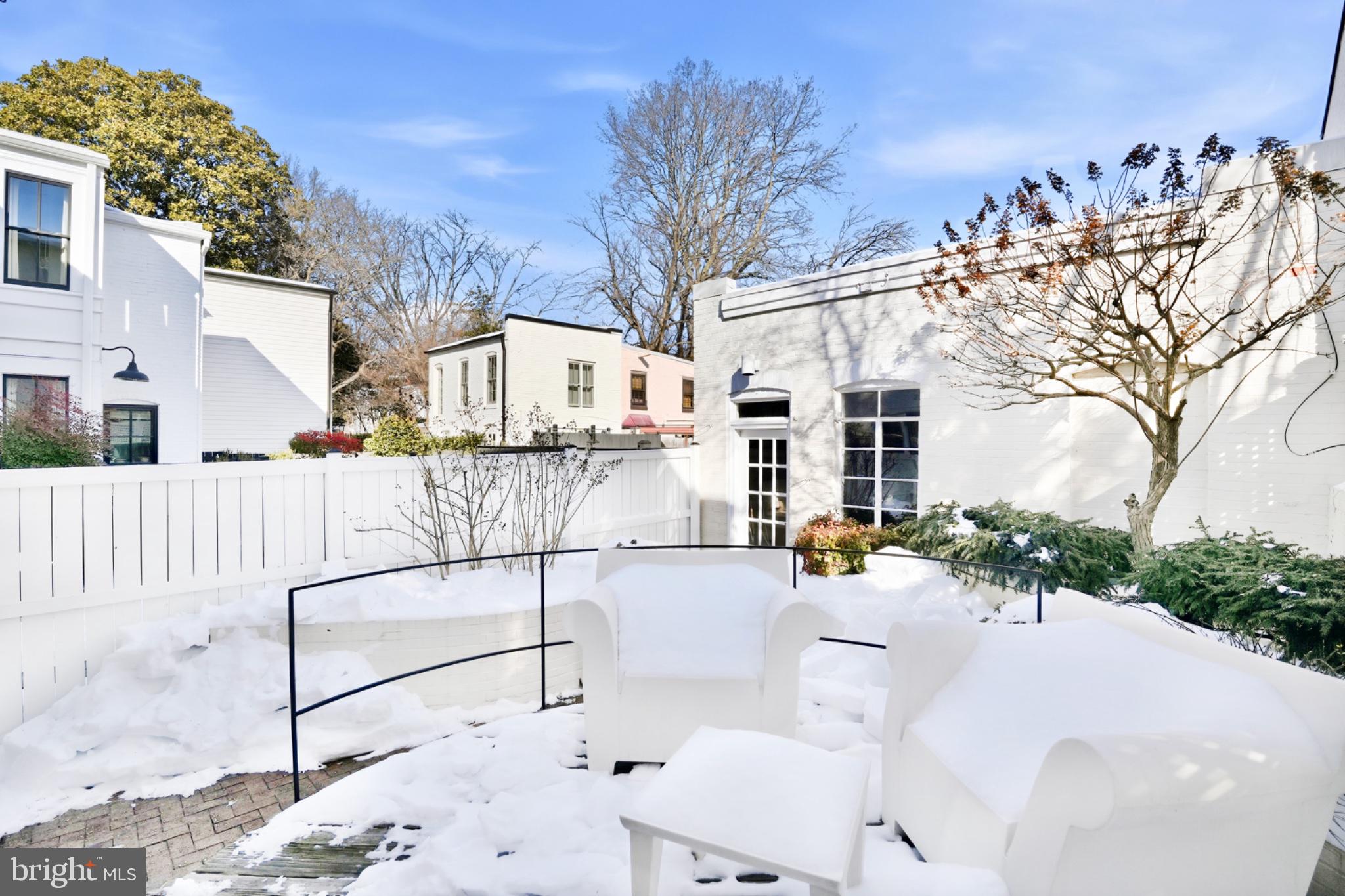 1635 35th Street Northwest Washington, DC 20007 - Photo 24 of 27 a view of a white house with a yard