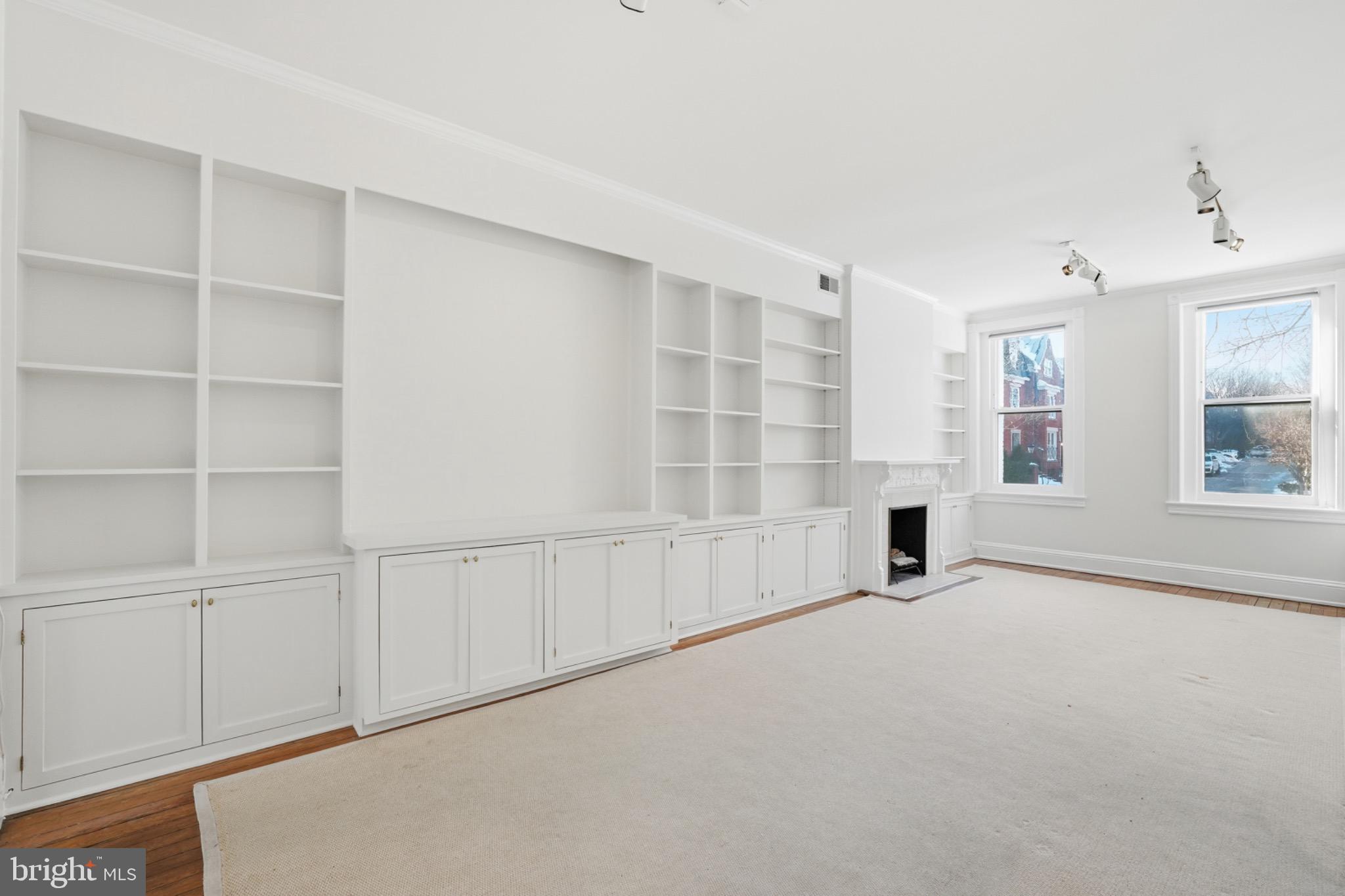 1635 35th Street Northwest Washington, DC 20007 - Photo 6 of 27 an empty room with windows