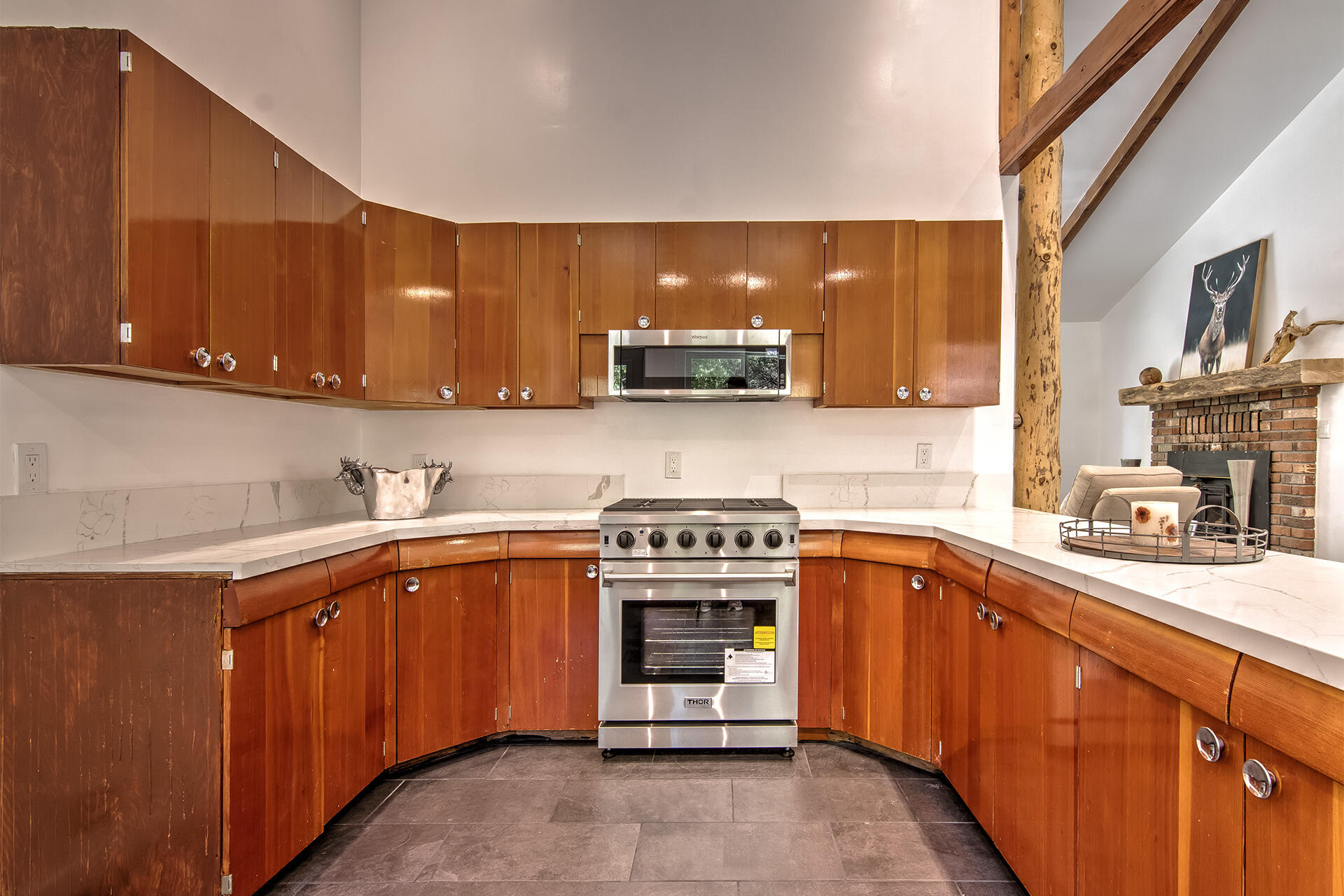 25106 Rim Rock Road Idyllwild, CA 92549 - Photo 19 of 90 a kitchen with stainless steel appliances granite countertop a stove sink and cabinets