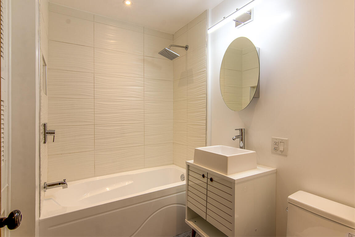 25106 Rim Rock Road Idyllwild, CA 92549 - Photo 30 of 90 a bathroom with a sink toilet and shower