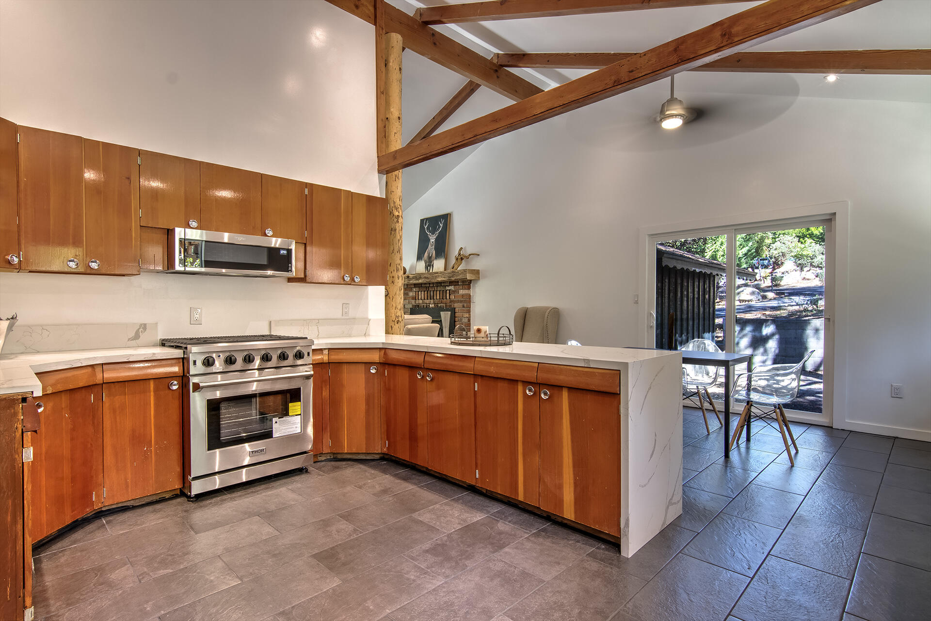 25106 Rim Rock Road Idyllwild, CA 92549 - Photo 3 of 90 a kitchen with stainless steel appliances granite countertop a stove and a sink