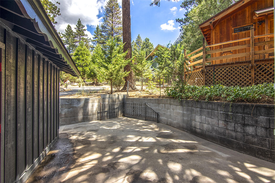 25106 Rim Rock Road Idyllwild, CA 92549 - Photo 40 of 90 a backyard of a house with a lake view