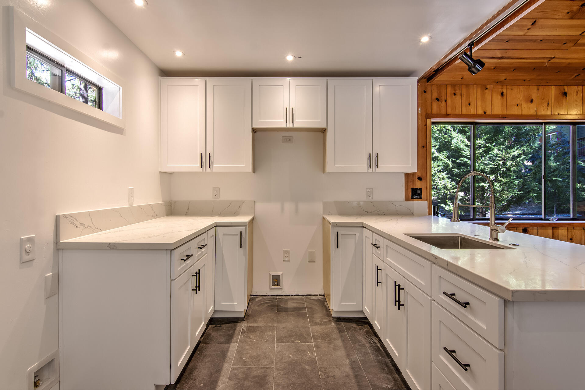 25106 Rim Rock Road Idyllwild, CA 92549 - Photo 53 of 90 a kitchen with granite countertop a sink and a stove