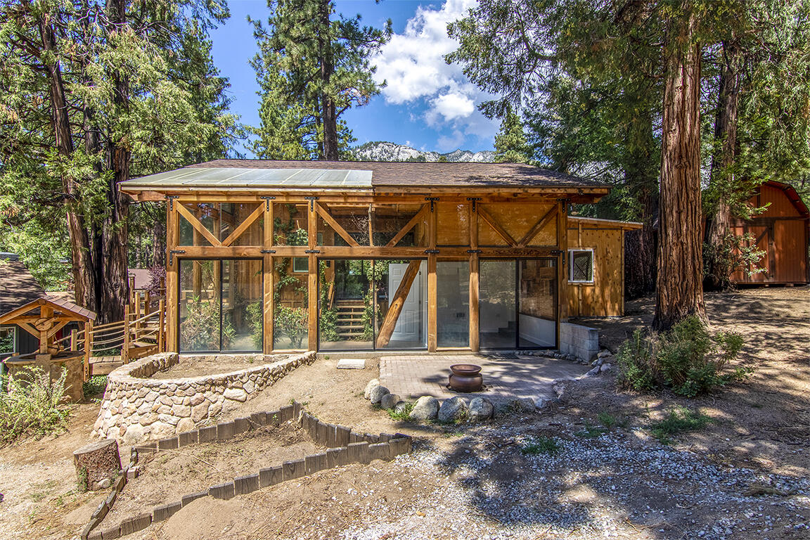 25106 Rim Rock Road Idyllwild, CA 92549 - Photo 77 of 90 a view of a house with a yard