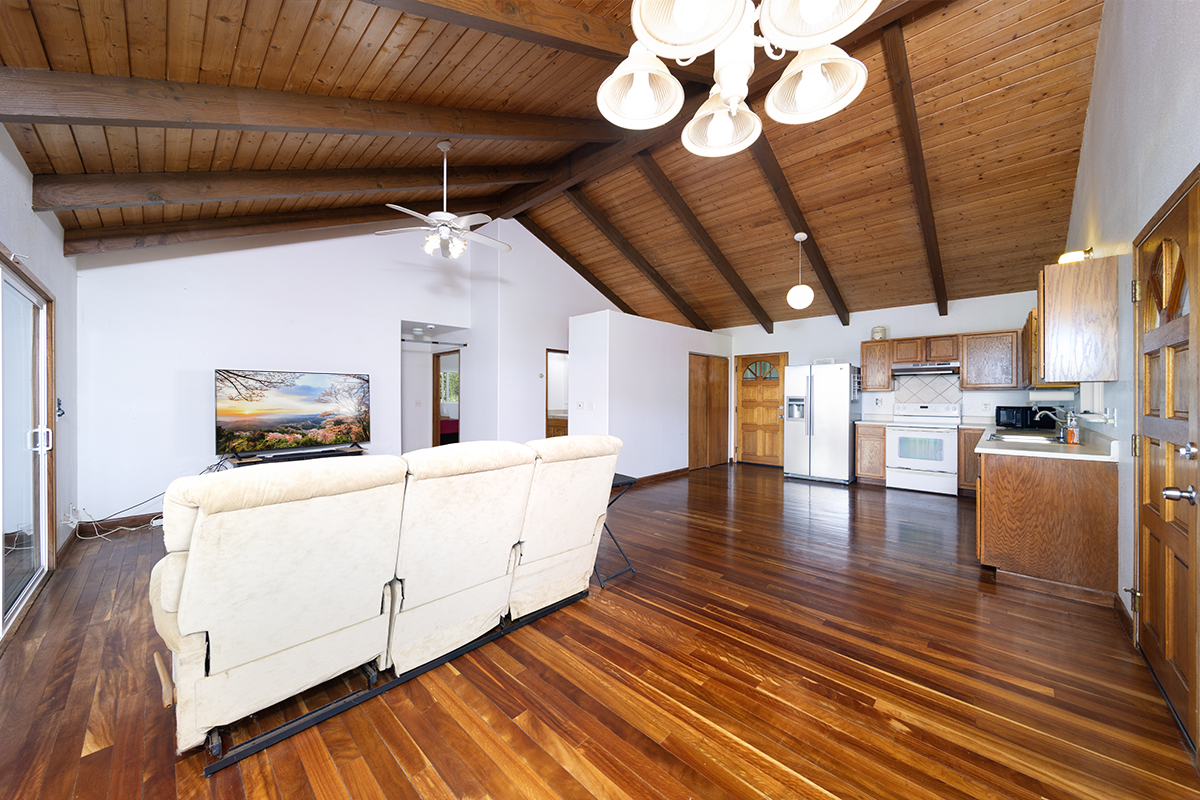 25-3301 Pakelekia Street Hilo, HI 96720 - Photo 11 of 30 a view of a room with wooden floor