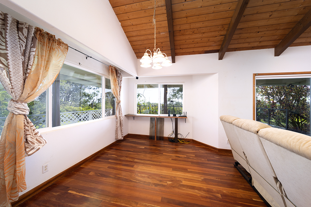 25-3301 Pakelekia Street Hilo, HI 96720 - Photo 12 of 30 a view of a porch with furniture and a backyard