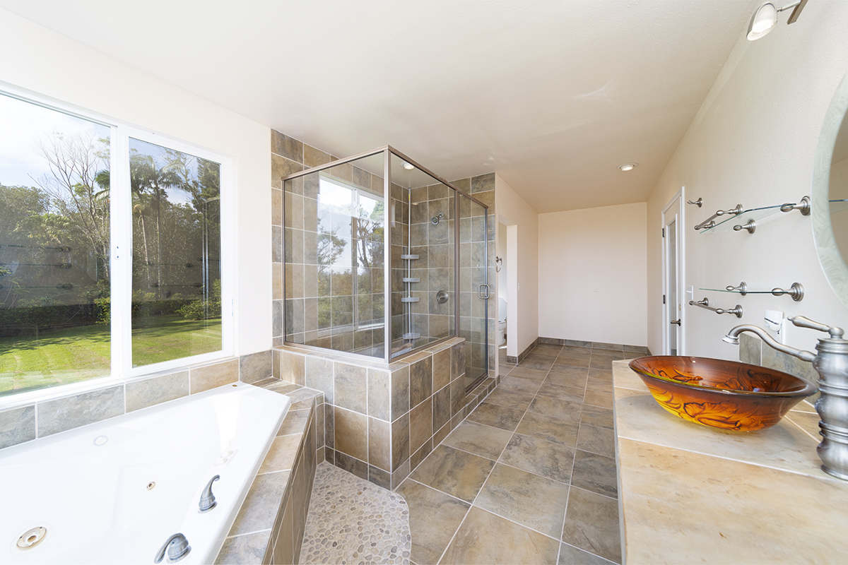 25-3301 Pakelekia Street Hilo, HI 96720 - Photo 22 of 30 a bathroom with a tub sink and shower