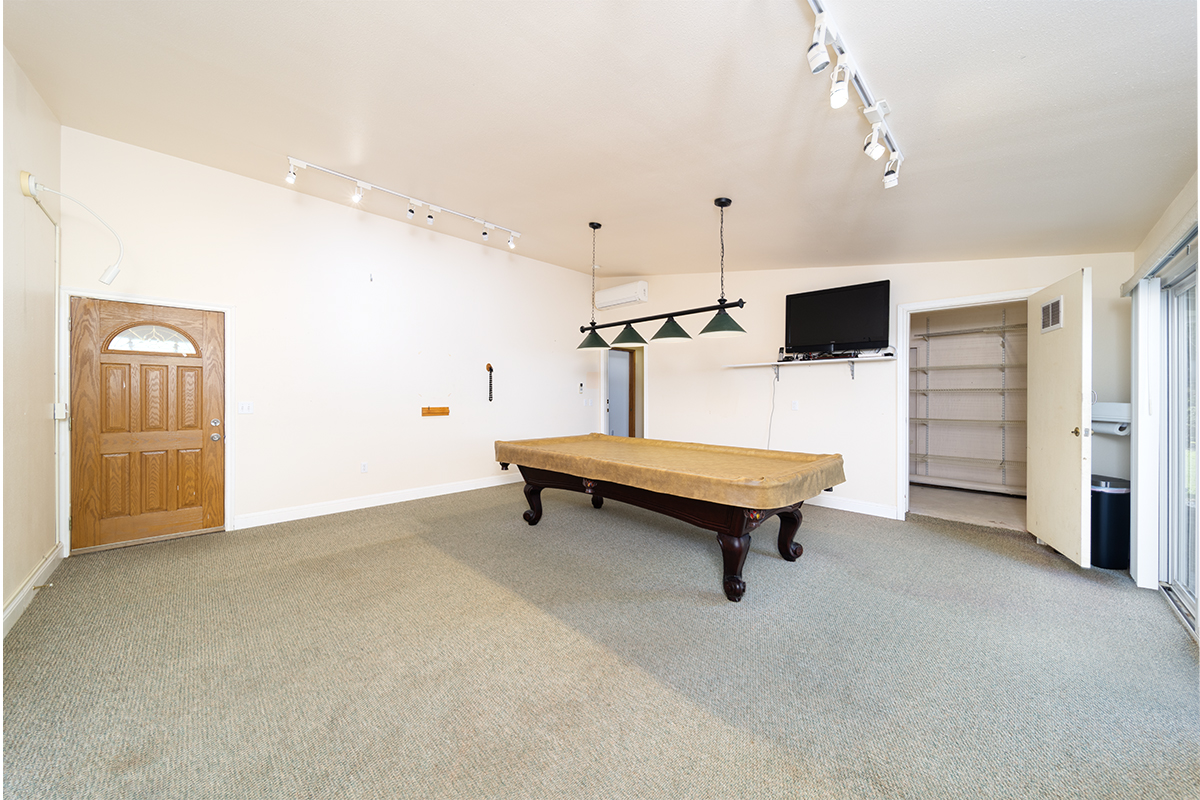 25-3301 Pakelekia Street Hilo, HI 96720 - Photo 25 of 30 a sitting area with pool table and windows