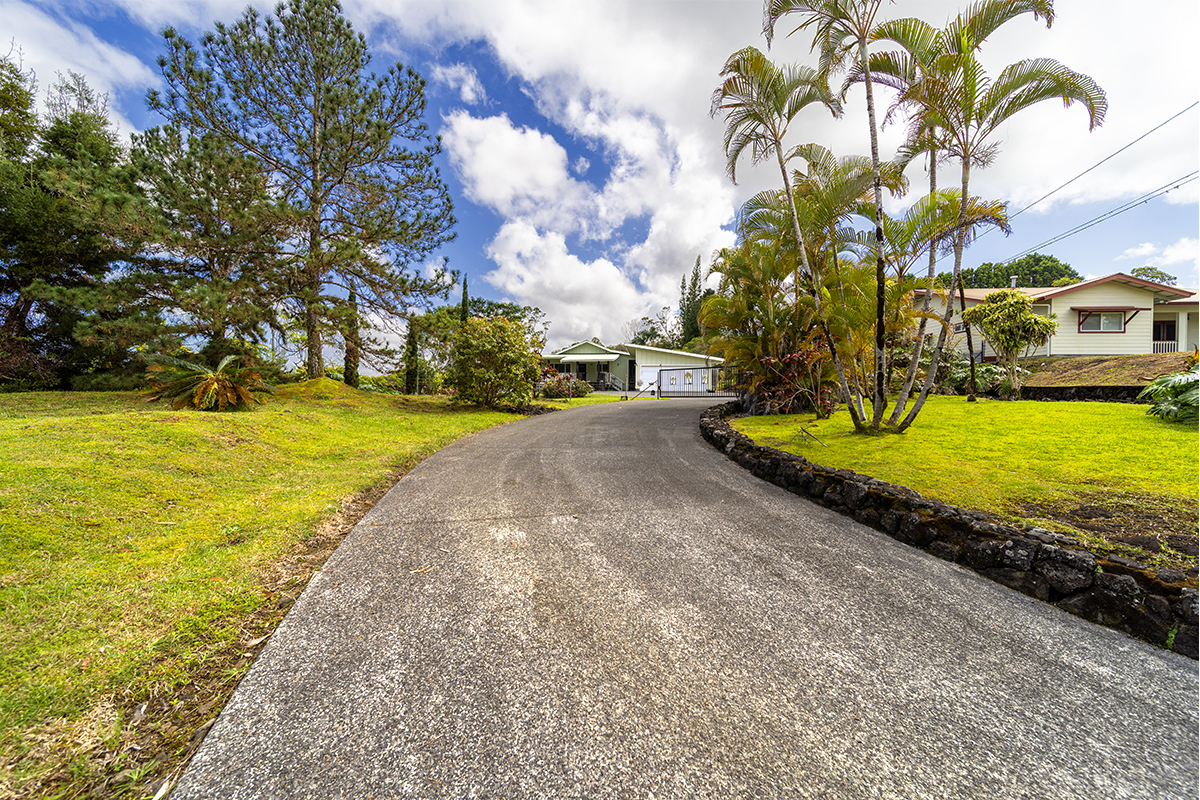 25-3301 Pakelekia Street Hilo, HI 96720 - Photo 4 of 30 a view of a yard with swimming pool