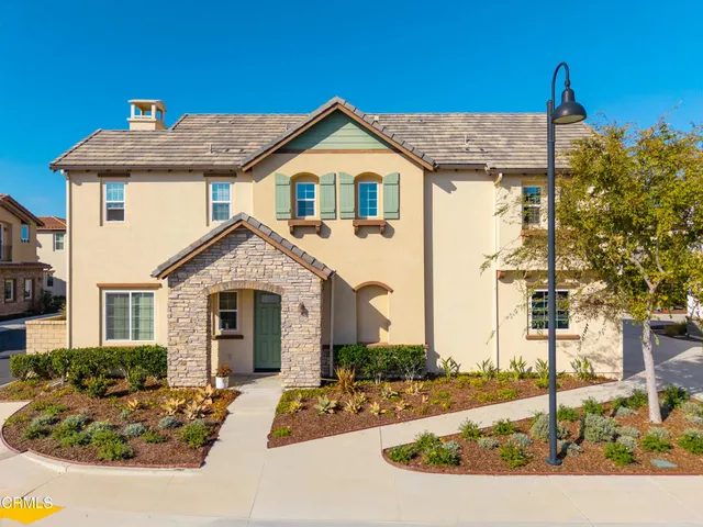 a front view of a house with a porch