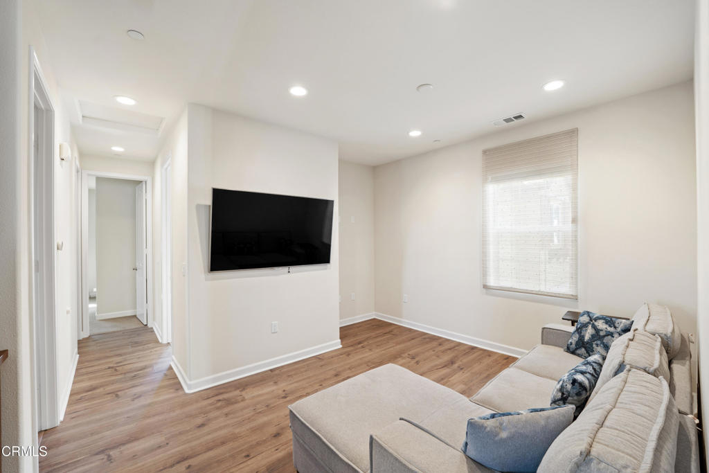 1655 Range Road Oxnard, CA 93036 - Photo 17 of 33 a living room with furniture and a flat screen tv