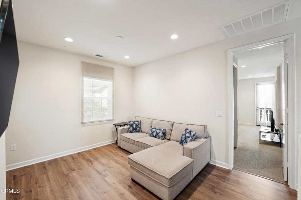 1655 Range Road Oxnard, CA 93036 - Photo 18 of 33 a living room with furniture and a wooden floor