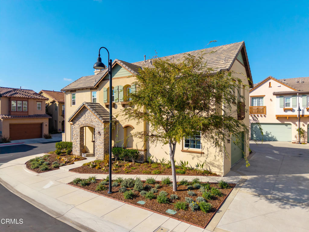 1655 Range Road Oxnard, CA 93036 - Photo 2 of 33 a front view of a house with garden