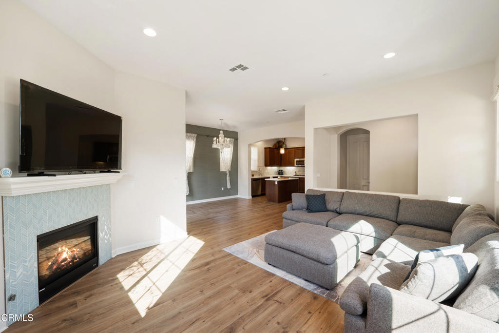 1655 Range Road Oxnard, CA 93036 - Photo 7 of 33 a living room with furniture and a flat screen tv