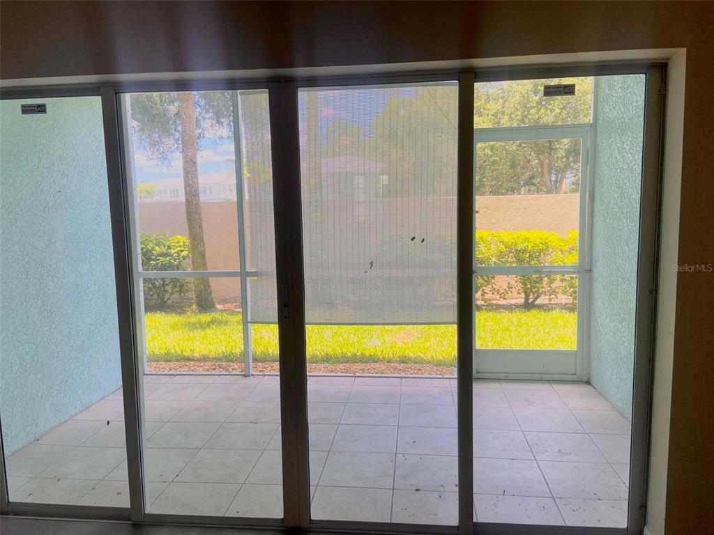 5771 Sabal Trace Drive, Unit 102 B5771 North Port, FL 34287 - Photo 12 of 37 a view of an empty room and a window