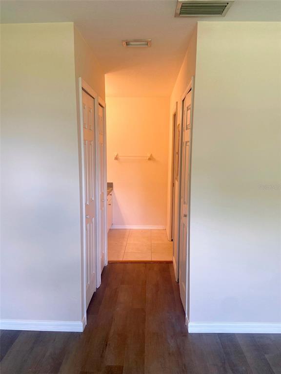 5771 Sabal Trace Drive, Unit 102 B5771 North Port, FL 34287 - Photo 18 of 37 a view of a glass door with a hallway