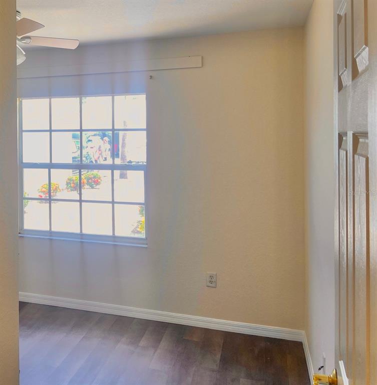 5771 Sabal Trace Drive, Unit 102 B5771 North Port, FL 34287 - Photo 26 of 37 an empty room with a window
