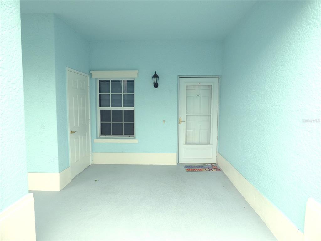 5771 Sabal Trace Drive, Unit 102 B5771 North Port, FL 34287 - Photo 35 of 37 a view of an empty room with a window