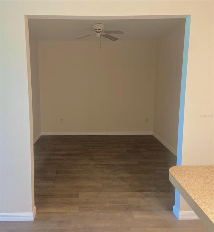 5771 Sabal Trace Drive, Unit 102 B5771 North Port, FL 34287 - Photo 10 of 37 a view of an empty room