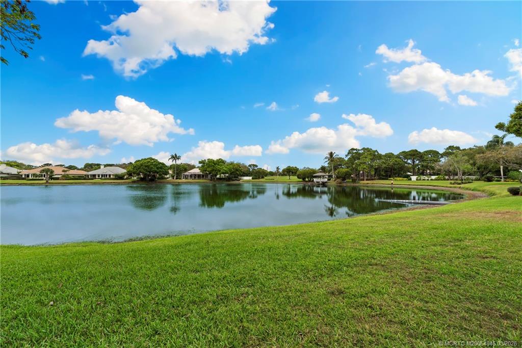 3510 Southeast Cambridge Drive Stuart, FL 34997 - Photo 27 of 38 Enjoy the wildlife visiting the lake with views of the gazebo