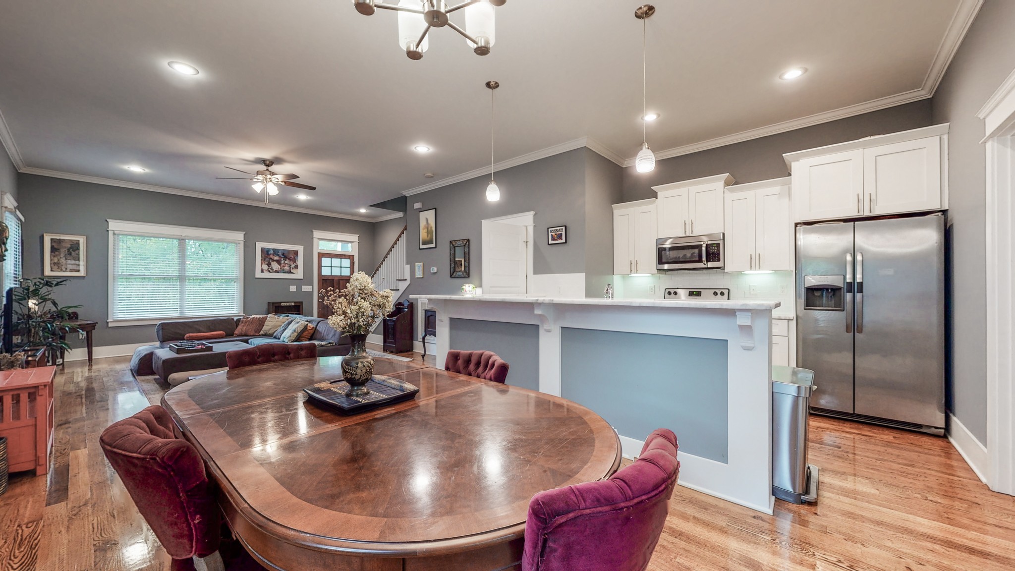 2007 Overby Road, Unit A Nashville, TN 37207 - Photo 11 of 29 a kitchen with sink a refrigerator and chairs