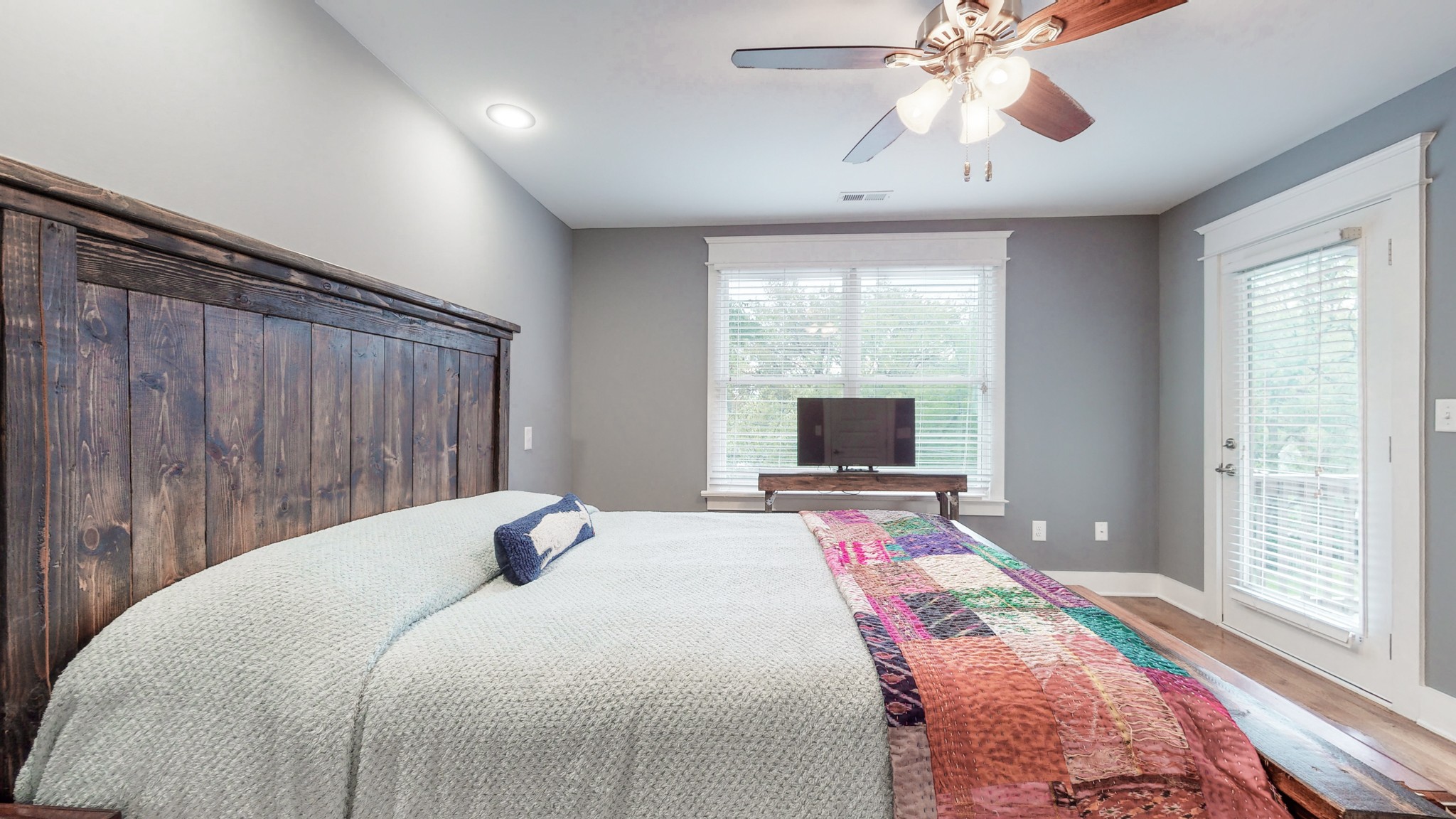 2007 Overby Road, Unit A Nashville, TN 37207 - Photo 20 of 29 a bedroom with a bed and a chandelier