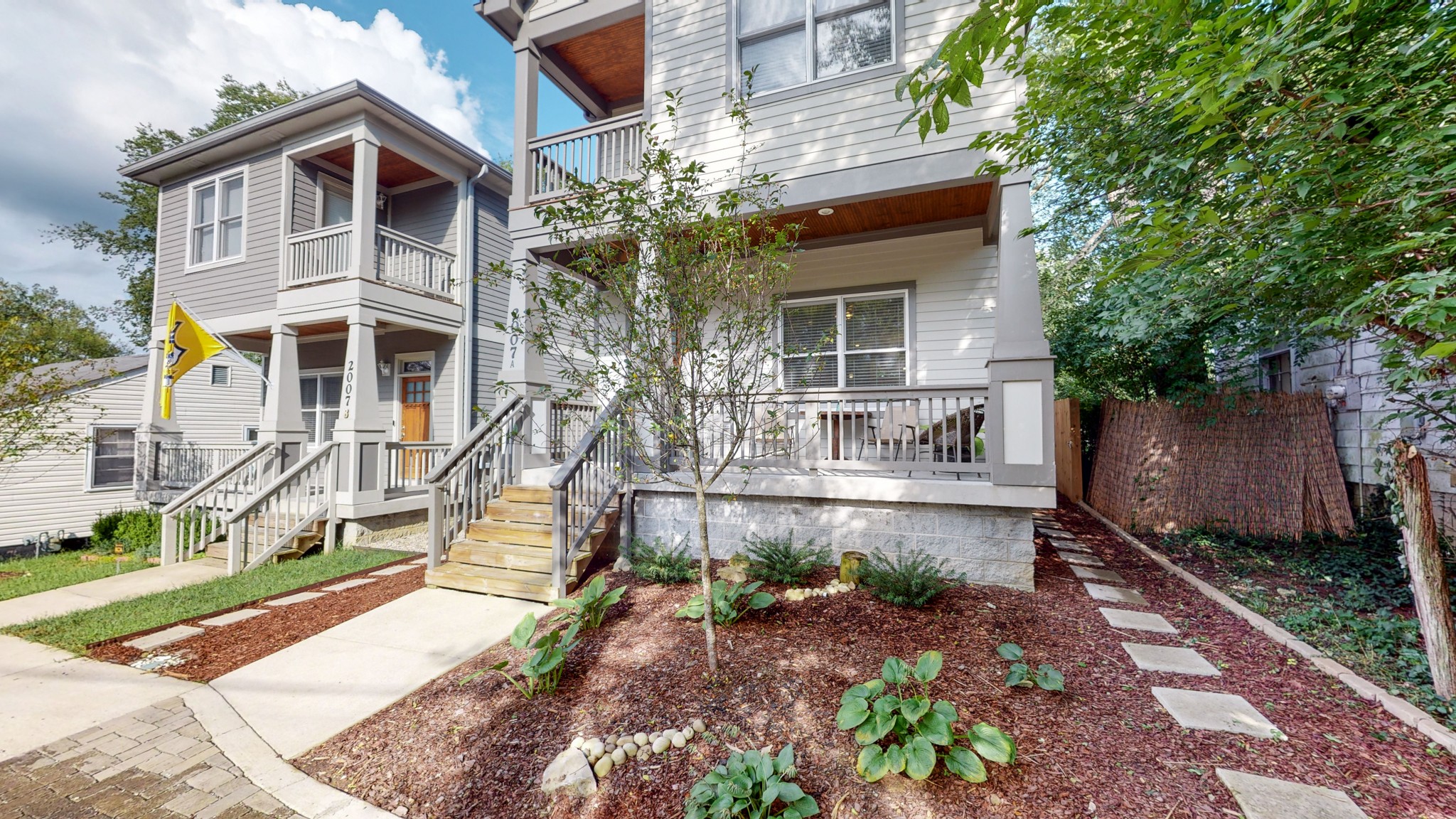 2007 Overby Road, Unit A Nashville, TN 37207 - Photo 2 of 29 a front view of a house with garden