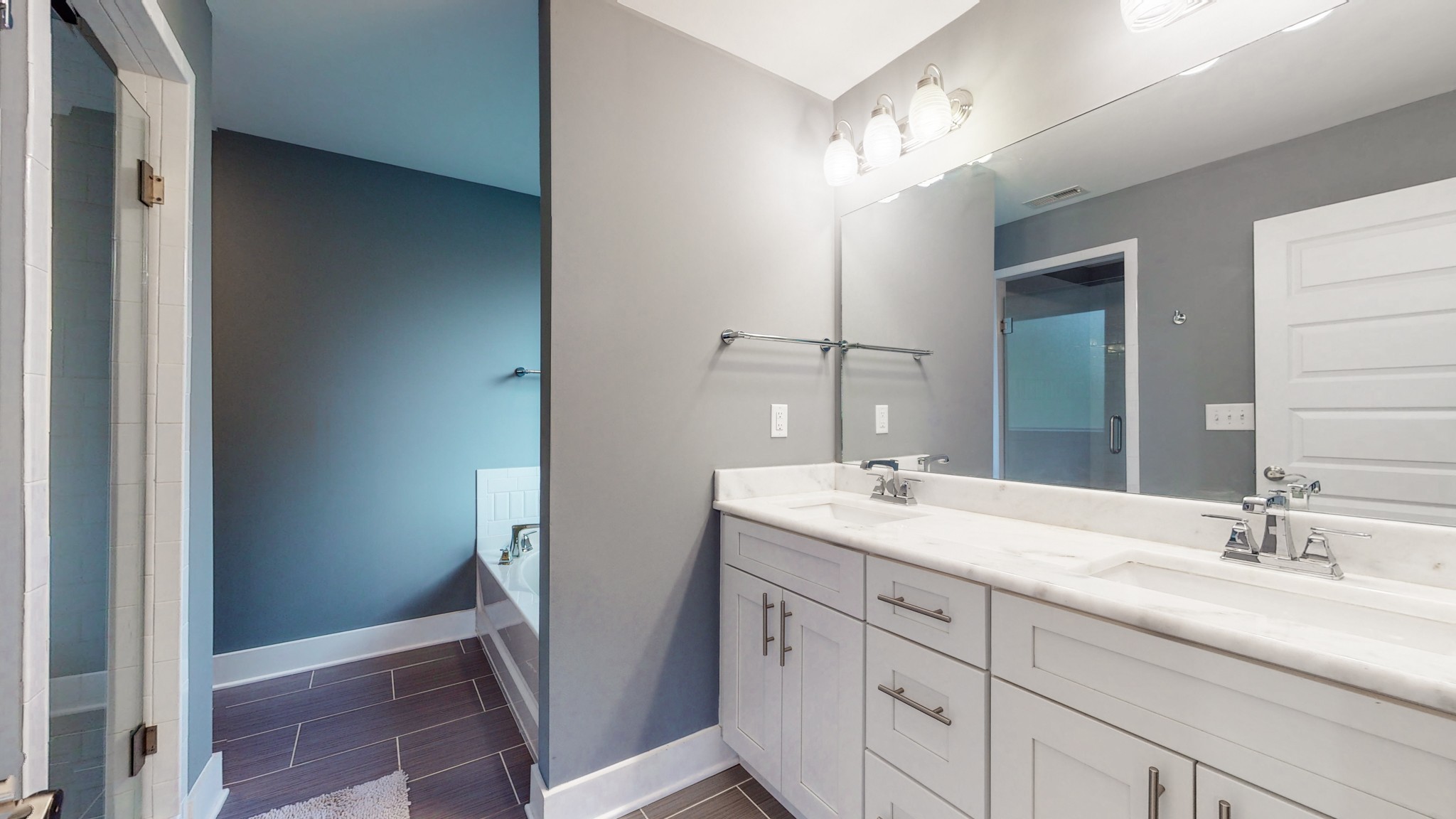 2007 Overby Road, Unit A Nashville, TN 37207 - Photo 23 of 29 a bathroom with a double vanity sink and a mirror