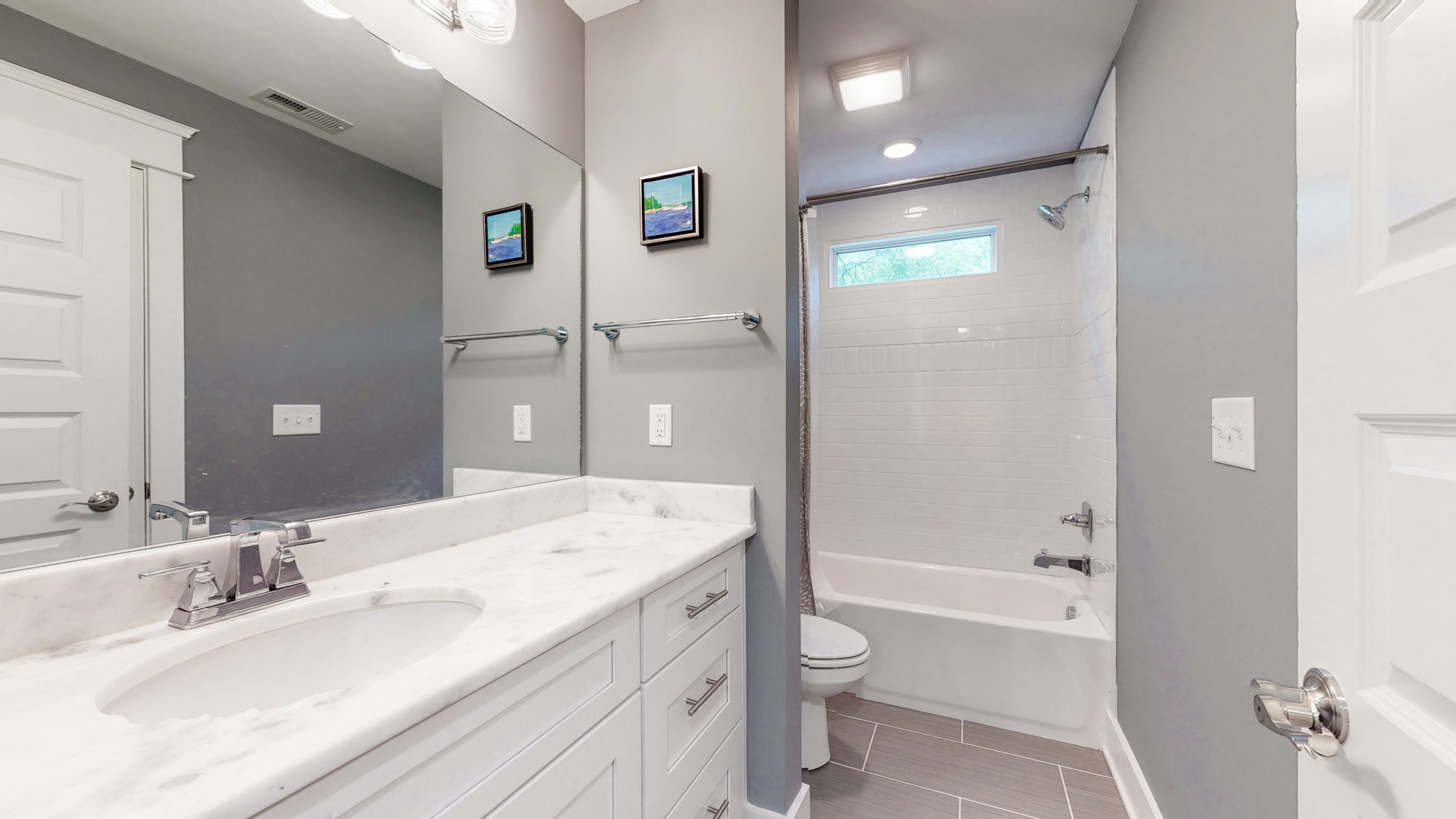 2007 Overby Road, Unit A Nashville, TN 37207 - Photo 29 of 29 a bathroom with a granite countertop sink toilet and shower