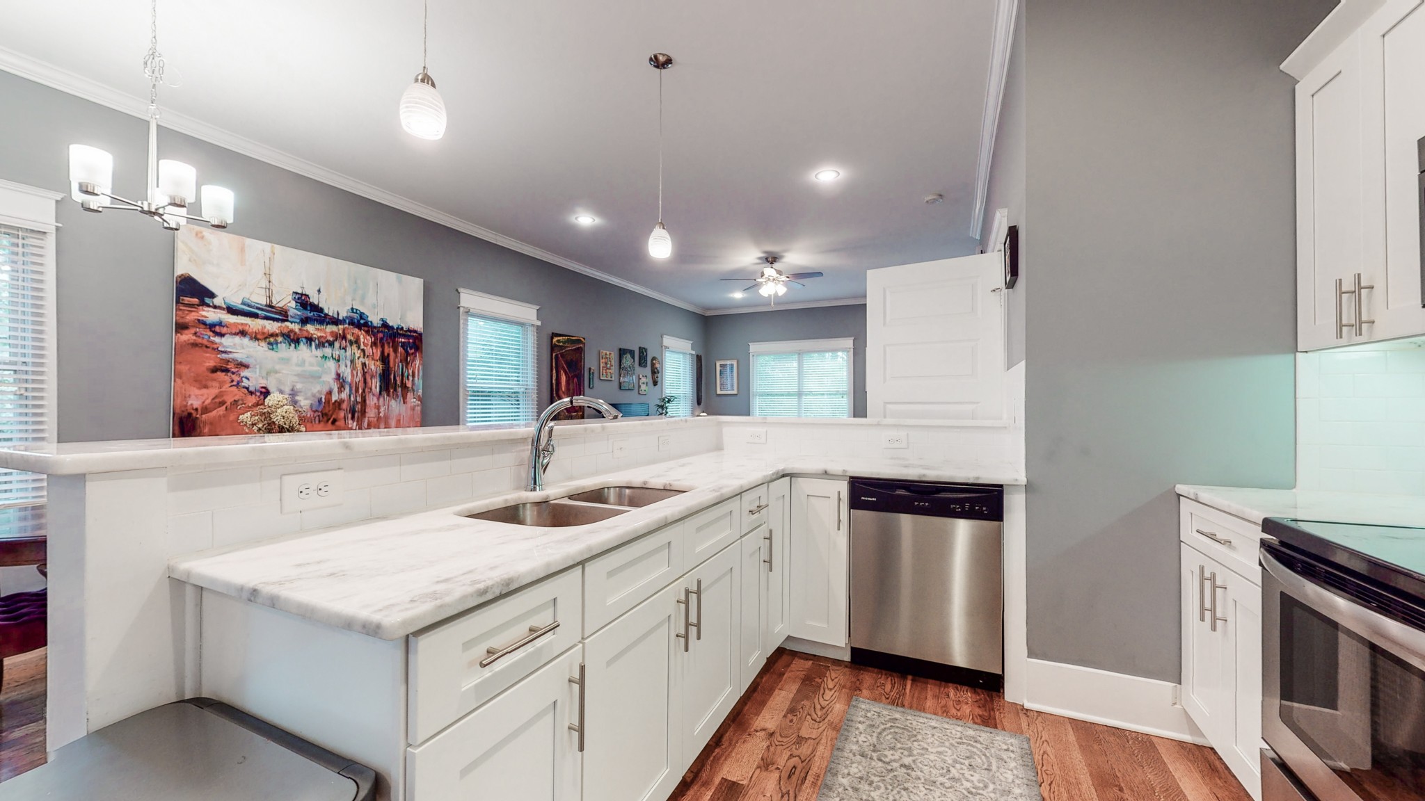 2007 Overby Road, Unit A Nashville, TN 37207 - Photo 8 of 29 a kitchen with granite countertop white cabinets and white appliances