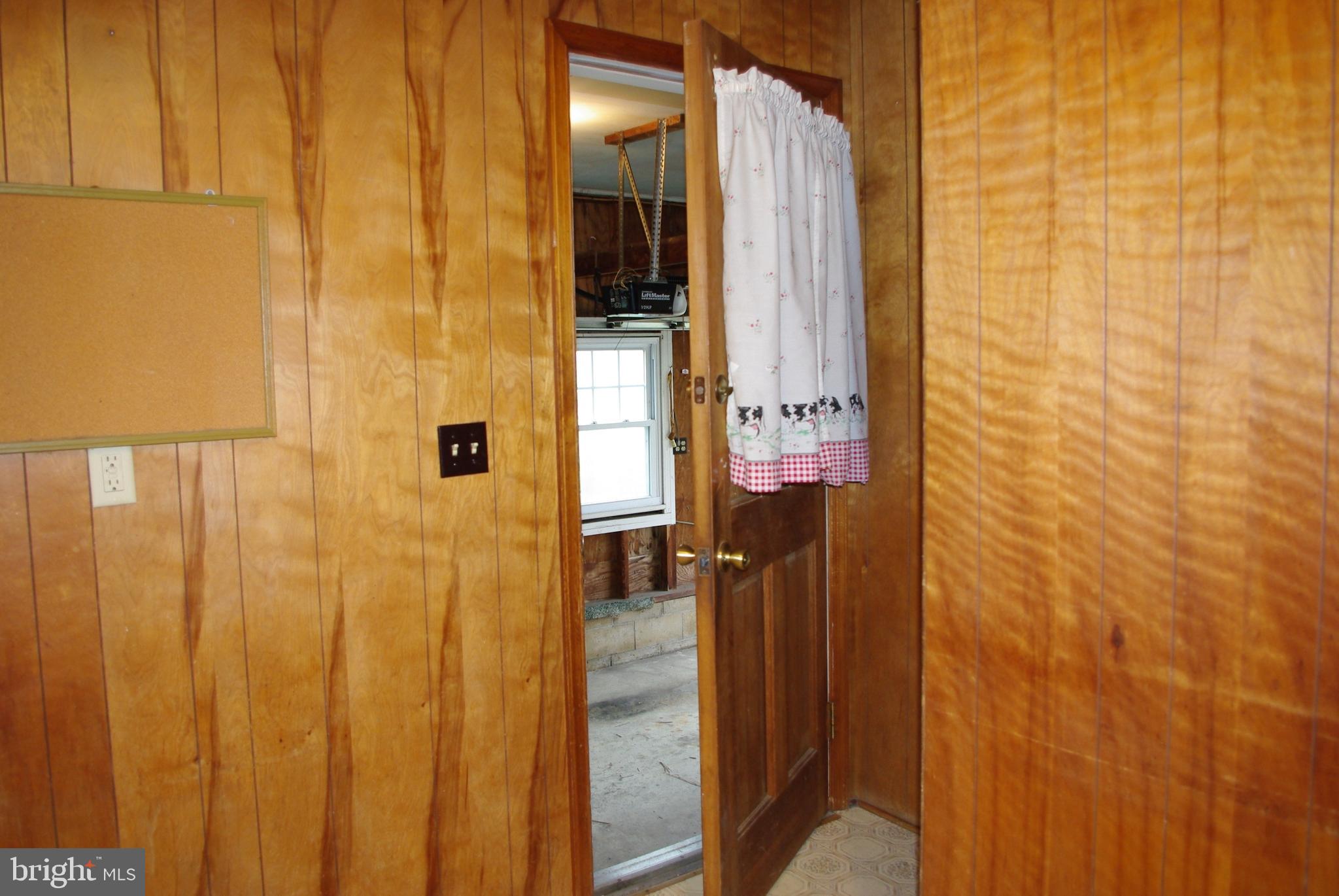 33094 Maryland Line Road Massey, MD 21650 - Photo 8 of 38 From Kitchen to Garage