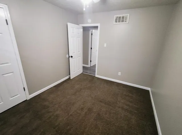 an empty room with closet